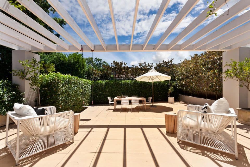 pergola-ideas-outdoor-oasis-partially-covered-by-a-pergola